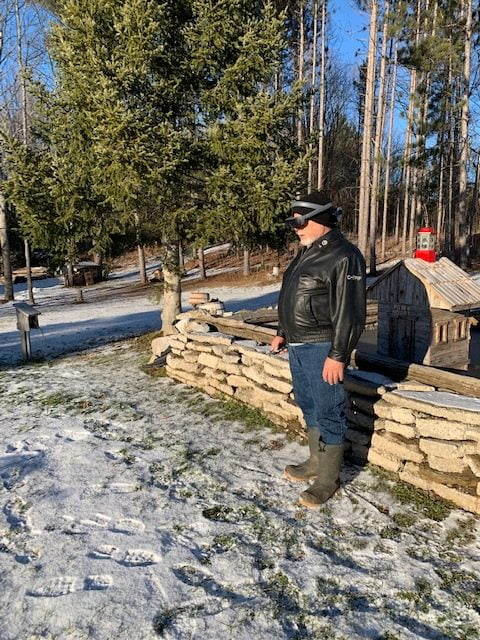 eSight user Gary Foster walking outside during winter