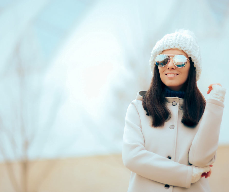 woman wearing sunglasses outside in winter