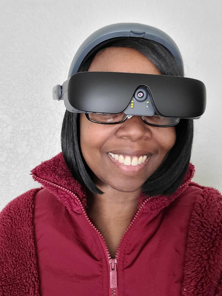 eSight user, Jessica Jackson smiling while wearing her eSight 4.
