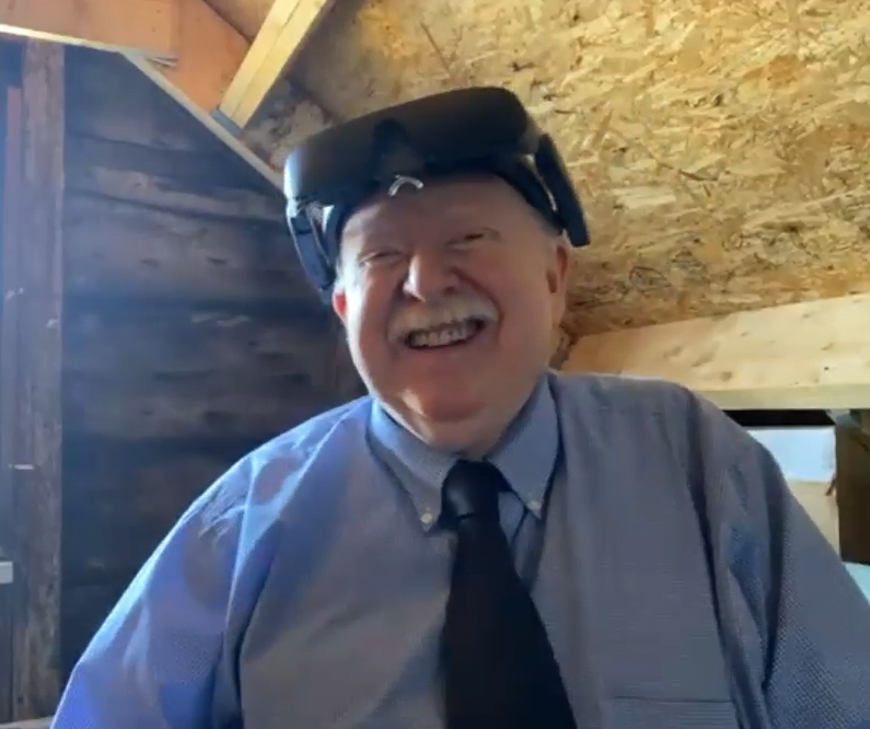 Claude smiling while wearing his eSight 4.